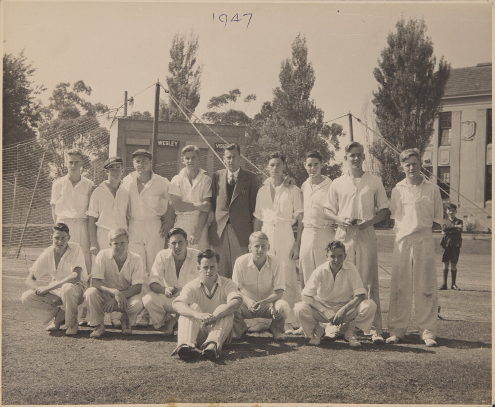 Cricket XI 1947 against the nets