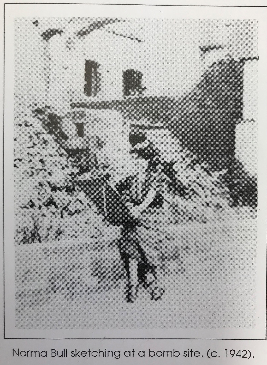 Norma Bull sketching at a bomb site